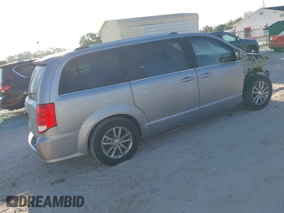 2018 Dodge Grand Caravan SXT with VIN 2C4RDGCG5JR267428, listed as a IAAI auction lot 41877661 with 103,633 mi miles and . Bid and sale history available at DreamBid. Image 4.