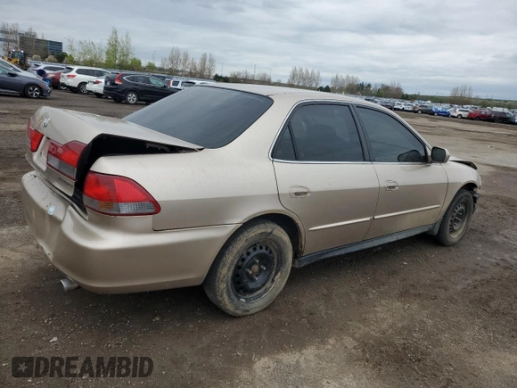 2001 Honda Accord LX z VIN 1HGCG56471A806768, wystawiony jako Copart lot #57066765 z przebiegiem 166 743 mil mil oraz Czysty tytuł • Clean title. Historia ofert i sprzedaży dostępna na DreamBid. Obrazek 3.