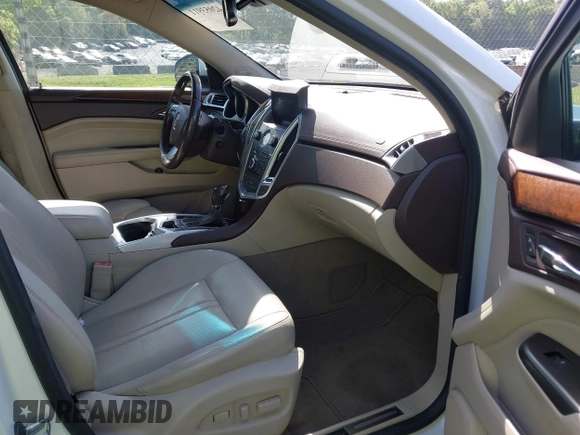 2012 Cadillac SRX Performance Collection с VIN 3GYFNBE30CS599466, выставлен на аукционе IAAI как лот 42053911 с пробегом 167 242 миль миль и . История ставок и продаж доступна на DreamBid. Изображение 5.