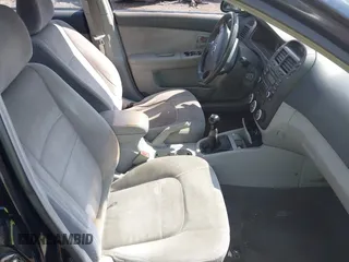 2007 Kia Spectra EX z VIN KNAFE121075478632, wystawiony jako IAAI lot #42167731 z przebiegiem 217 432 mil mil oraz . Historia ofert i sprzedaży dostępna na DreamBid. Obrazek 5.