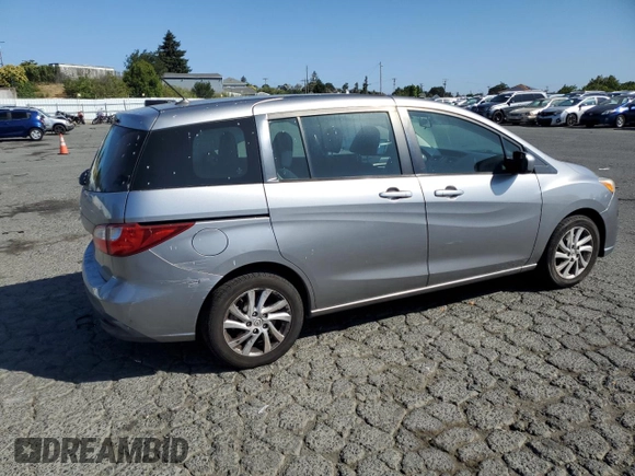 2012 Mazda 5 Sport with VIN JM1CW2BL4C0107068, listed as a Copart auction lot 62880615 with 142,610 mi miles and Salvage title. Bid and sale history available at DreamBid. Image 3.