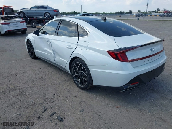 2021 Hyundai Sonata N Line with VIN 5NPEK4JC7MH125036, listed as a IAAI auction lot 41813459 with 32,131 mi miles. Bid and sale history available at carsss.com. Image 3.