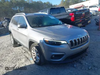 2019 Jeep Cherokee Latitude with VIN 1C4PJLCX6KD285305, listed as a IAAI auction lot 41670351 with 20,343 mi miles. Bid and sale history available at carsss.com. Image 1.