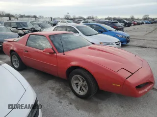 1991 Pontiac Firebird with VIN 1G2FS23E5ML200758, listed as a Copart auction lot 84013464 with 156,810 mi miles and Salvage title. Bid and sale history available at DreamBid. Image 4.