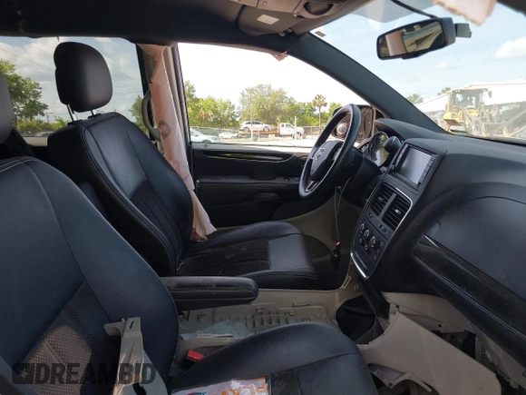 2014 Dodge Grand Caravan SXT with VIN 2C4RDGCG3ER193688, listed as a IAAI auction lot 41290544 with 73,092 mi miles and . Bid and sale history available at DreamBid. Image 5.