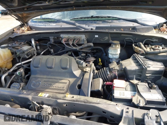 2006 Mazda Tribute LX with VIN 4F2YZ94136KM23037, listed as a IAAI auction lot 42220090 with 144,039 mi miles and . Bid and sale history available at carsss.com. Image 10.