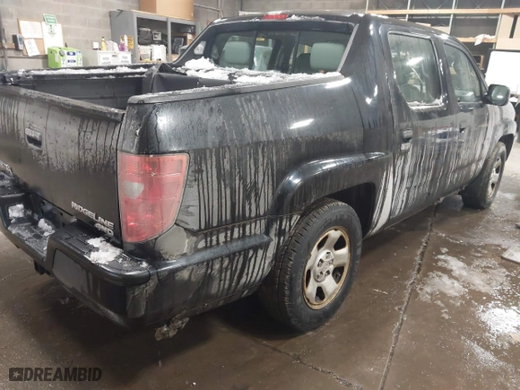 2009 Honda Ridgeline RT with VIN 5FPYK16289B101207, listed as a IAAI auction lot 41277609 with 101,022 mi miles. Bid and sale history available at carsss.com. Image 4.