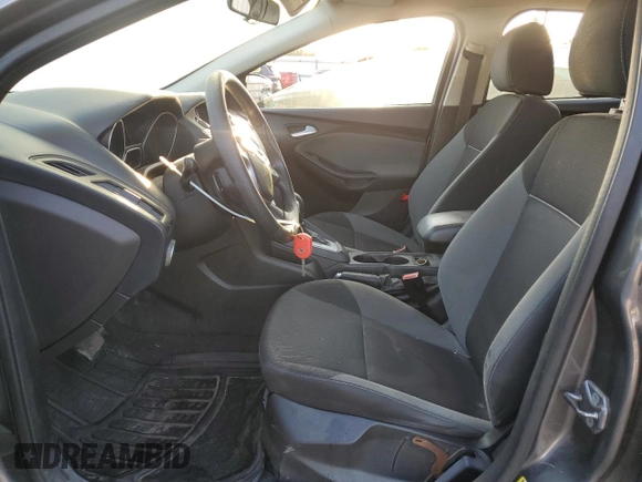2013 Ford Focus SE z VIN 1FADP3F22DL233878, wystawiony jako Copart lot #52598475 z przebiegiem 131 539 mil mil oraz Szkoda całkowita • Salvage title. Historia ofert i sprzedaży dostępna na DreamBid. Obrazek 7.