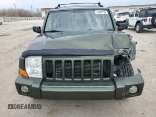 2006 Jeep Commander with VIN 1J8HG48K06C297654, listed as a Copart auction lot 51000155 with 126,235 mi miles and Salvage Title. Bid and sale history available at DreamBid. Image 5.