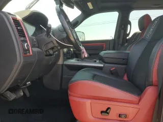 2016 Ram 1500 Rebel z VIN 1C6RR7YT1GS350439, wystawiony jako Copart lot #52300885 z przebiegiem 196 557 mil mil oraz Szkody całkowita. Historia ofert i sprzedaży dostępna na DreamBid. Obrazek 7.