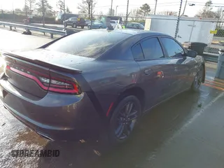 2019 Dodge Charger SXT with VIN 2C3CDXJG1KH743324, listed as a IAAI auction lot 41530661 with 113,183 mi miles and . Bid and sale history available at DreamBid. Image 4.