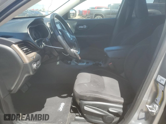 2015 Jeep Cherokee Latitude with VIN 1C4PJMCB6FW734003, listed as a Copart auction lot 54659085 with 146,379 mi miles and Salvage Title. Bid and sale history available at DreamBid. Image 7.