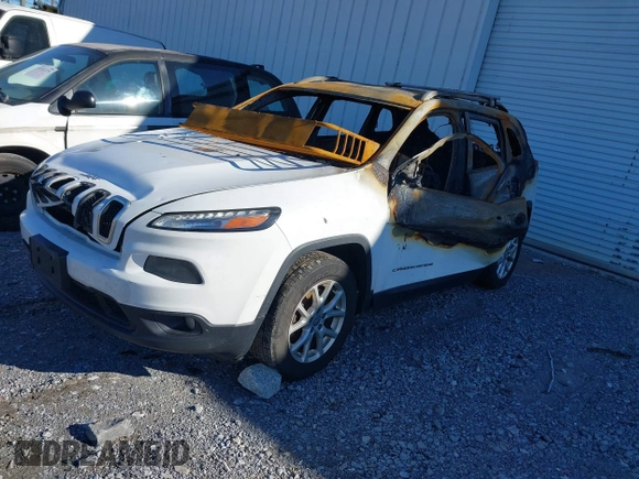 2014 Jeep Cherokee Altitude with VIN 1C4PJMCB5EW120946, listed as a IAAI auction lot 41348100 with Not Provided miles and . Bid and sale history available at DreamBid. Image 16.