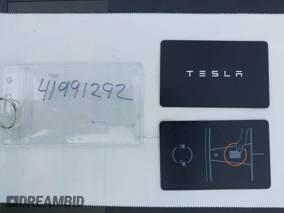 2024 Tesla Model Y Long Range with VIN 7SAYGAEE5RF981789, listed as a IAAI auction lot 41991292 with 21,103 mi miles. Bid and sale history available at carsss.com. Image 11.