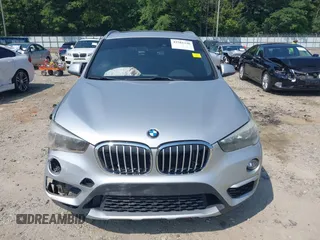 2018 BMW X1 xDrive28i with VIN WBXHT3C39J5L27926, listed as a IAAI auction lot 42582330 with 101,197 mi miles and . Bid and sale history available at DreamBid. Image 12.