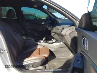 2021 BMW 2 Series M235i xDrive with VIN WBA13AL06M7G61056, listed as a IAAI auction lot 41140205 with 49,413 mi miles and . Bid and sale history available at DreamBid. Image 5.