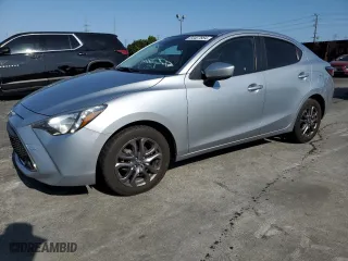 2019 Toyota Yaris Sedan L with VIN 3MYDLBYV2KY507562, listed as a Copart auction lot 64407884 with 85,982 mi miles and Salvage Title. Bid and sale history available at carsss.com. Image 1.