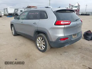2014 Jeep Cherokee Limited with VIN 1C4PJLDB2EW160202, listed as a IAAI auction lot 41031874 with 168,181 mi miles. Bid and sale history available at carsss.com. Image 3.
