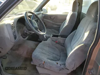 1999 GMC Sonoma with VIN 1GTCS1442X8530573, listed as a Copart auction lot 83484424 with 262,269 mi miles and Salvage Title. Bid and sale history available at carsss.com. Image 7.
