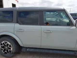 2023 Ford Bronco z VIN 1FMEE5BP9PLA97587, wystawiony jako IAAI lot #42168516 z przebiegiem 29 622 mil mil oraz . Historia ofert i sprzedaży dostępna na DreamBid. Obrazek 13.
