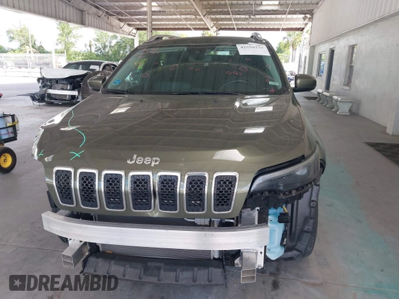 2021 Jeep Cherokee Altitude with VIN 1C4PJLLB5MD203569, listed as a IAAI auction lot 42559737 with 53,961 mi miles and . Bid and sale history available at DreamBid. Image 13.