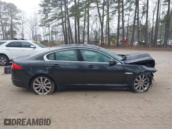 2014 Jaguar XF V6 SC with VIN SAJWJ0EF9E8U12853, listed as a IAAI auction lot 41780409 with 138,329 mi miles. Bid and sale history available at carsss.com. Image 14.