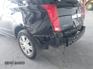 2011 Cadillac SRX Luxury Collection z VIN 3GYFNAEY9BS653352, wystawiony jako IAAI lot #42345078 z przebiegiem 118 030 mil mil oraz . Historia ofert i sprzedaży dostępna na DreamBid. Obrazek 13.