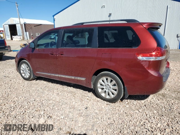 2014 Toyota Sienna LE with VIN 5TDJK3DC5ES075494, listed as a Copart auction lot 50102035 with 151,375 mi miles and Salvage Title. Bid and sale history available at DreamBid. Image 2.