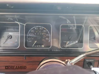 1987 Chevrolet Caprice z VIN 1G1BU51H7H9156079, wystawiony jako Copart lot #60443124 z przebiegiem 44 452 mil mil oraz Szkoda całkowita • Salvage title. Historia ofert i sprzedaży dostępna na DreamBid. Obrazek 9.