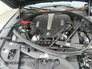 2013 BMW 7 Series 750Li xDrive with VIN WBAYF8C51DD140657, listed as a IAAI auction lot 32751348 with 128,816 mi miles. Bid and sale history available at carsss.com. Image 10.