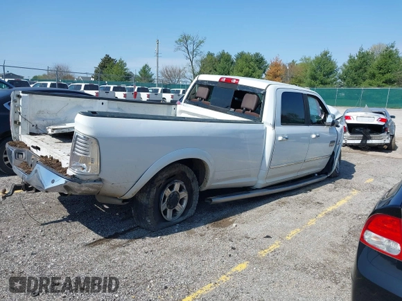 2013 Ram 2500 Laramie Longhorn with VIN 3C6UR5LL7DG522840, listed as a IAAI auction lot 41970385 with 145,144 mi miles and . Bid and sale history available at DreamBid. Image 4.