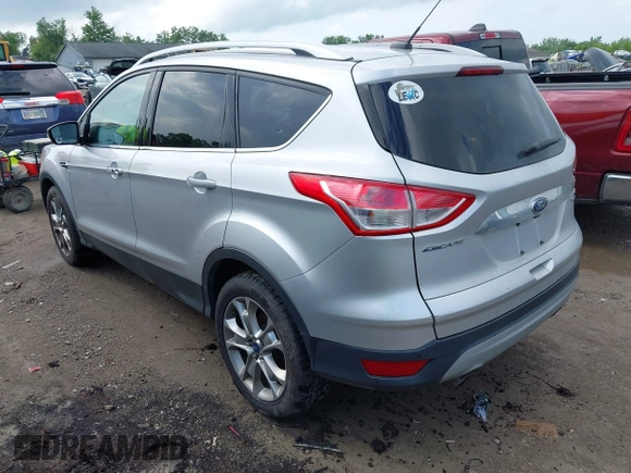 2016 Ford Escape Titanium with VIN 1FMCU9J95GUB93585, listed as a IAAI auction lot 42614106 with 124,465 mi miles and . Bid and sale history available at DreamBid. Image 3.