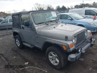 2002 Jeep Wrangler Sport with VIN 1J4FA49SX2P706691, listed as a IAAI auction lot 41965852 with 179,553 mi miles. Bid and sale history available at carsss.com. Image 1.
