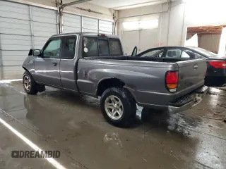 2000 Mazda B-Series 2WD Truck SE with VIN 4F4YR16V8YTM12086, listed as a Copart auction lot 82609244 with 297,354 mi miles and Salvage Title. Bid and sale history available at carsss.com. Image 2.