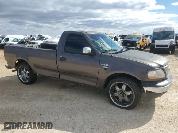 2002 Ford F-150 XL with VIN 1FTRF17W32KB68406, listed as a Copart auction lot 86059454 with 322,076 mi miles and Salvage Title. Bid and sale history available at carsss.com. Image 4.