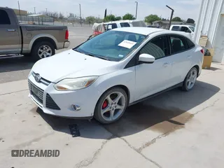 2012 Ford Focus SE with VIN 1FAHP3F25CL381667, listed as a IAAI auction lot 42025411 with 174,372 mi miles. Bid and sale history available at carsss.com. Image 2.
