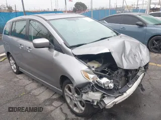 2010 Mazda 5 Sport with VIN JM1CR2WL0A0386100, listed as a IAAI auction lot 41806709 with 119,800 mi miles. Bid and sale history available at carsss.com. Image 1.