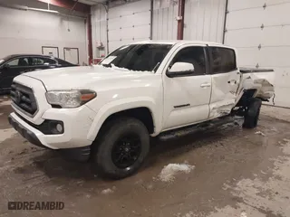 2022 Toyota Tacoma 4WD SR with VIN 3TMCZ5AN6NM469656, listed as a IAAI auction lot 41174550 with 49,953 mi miles. Bid and sale history available at carsss.com. Image 17.