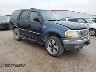 1999 Ford Expedition XLT z VIN 1FMPU18L5XLB26852, wystawiony jako IAAI lot #41566872 z przebiegiem Nie podano mil oraz . Historia ofert i sprzedaży dostępna na DreamBid. Obrazek 1.