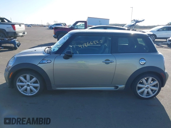 2007 MINI Hardtop S with VIN WMWMF73567TL91385, listed as a IAAI auction lot 41866865 with 114,778 mi miles and . Bid and sale history available at DreamBid. Image 14.