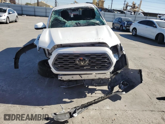 2020 Toyota Tacoma SR5 with VIN 3TMAZ5CN8LM115056, listed as a Copart auction lot 46948805 with 87,713 mi miles and Salvage title. Bid and sale history available at DreamBid. Image 5.