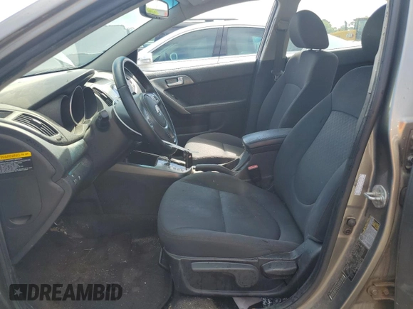 2010 Kia Forte SX с VIN KNAFW4A31A5242306, выставлен на аукционе Copart как лот 56427975 с пробегом 131 119 миль миль и Чистый • Clean title. История ставок и продаж доступна на DreamBid. Изображение 7.