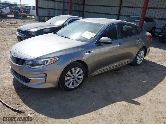 2018 Kia Optima S with VIN 5XXGT4L31JG267408, listed as a IAAI auction lot 41780014 with 111,940 mi miles. Bid and sale history available at carsss.com. Image 2.