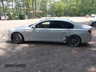 2013 BMW 7 Series 750Li with VIN WBAYE8C55DDS16013, listed as a IAAI auction lot 42709519 with 123,405 mi miles and . Bid and sale history available at DreamBid. Image 14.