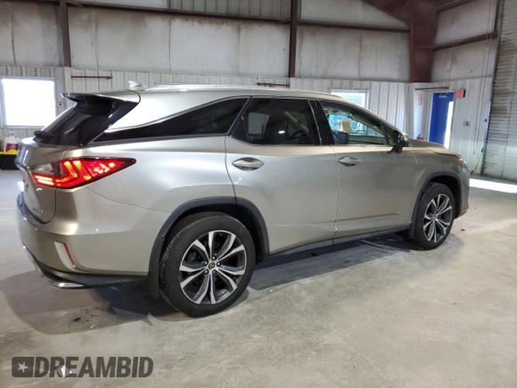 2020 Lexus RX 350L with VIN JTJHZKFA7L2024953, listed as a Copart auction lot 85044234 with 60,874 mi miles and Salvage title. Bid and sale history available at DreamBid. Image 3.