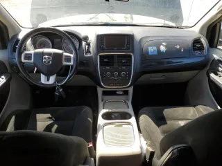 2015 Dodge Grand Caravan SXT with VIN 2C4RDGCG8FR584983, listed as a Copart auction lot 49457795 with 119,003 mi miles and Clean Title. Bid and sale history available at DreamBid. Image 8.