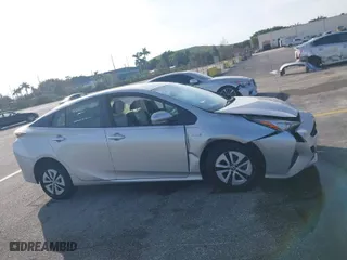 2016 Toyota Prius Four with VIN JTDKARFU1G3009156, listed as a IAAI auction lot 40906451 with 67,449 mi miles. Bid and sale history available at carsss.com. Image 13.