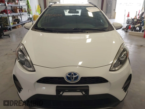 2018 Toyota Prius One with VIN JTDKDTB38J1599974, listed as a IAAI auction lot 41977533 with 71,225 mi miles and . Bid and sale history available at DreamBid. Image 6.