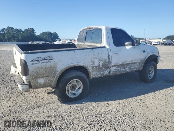 1998 Ford F-150 with VIN 1FTZF18W3WNB98041, listed as a Copart auction lot 77530824 with 194,712 mi miles and Salvage title. Bid and sale history available at DreamBid. Image 3.