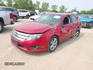 2012 Ford Fusion SE with VIN 3FAHP0HA6CR180400, listed as a IAAI auction lot 42412179 with 92,777 mi miles and . Bid and sale history available at DreamBid. Image 2.